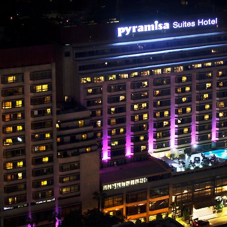 Pyramisa Suites Hotel Cairo Giza Extérieur photo The hotel at night